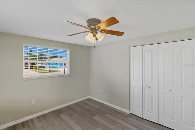 a house with a window and a ceiling fan