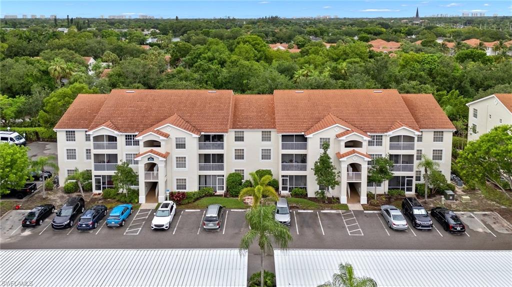 4635 St Croix Lane, Unit 1222 Naples, FL 34109 - Photo 19 of 20 an aerial view of multiple house