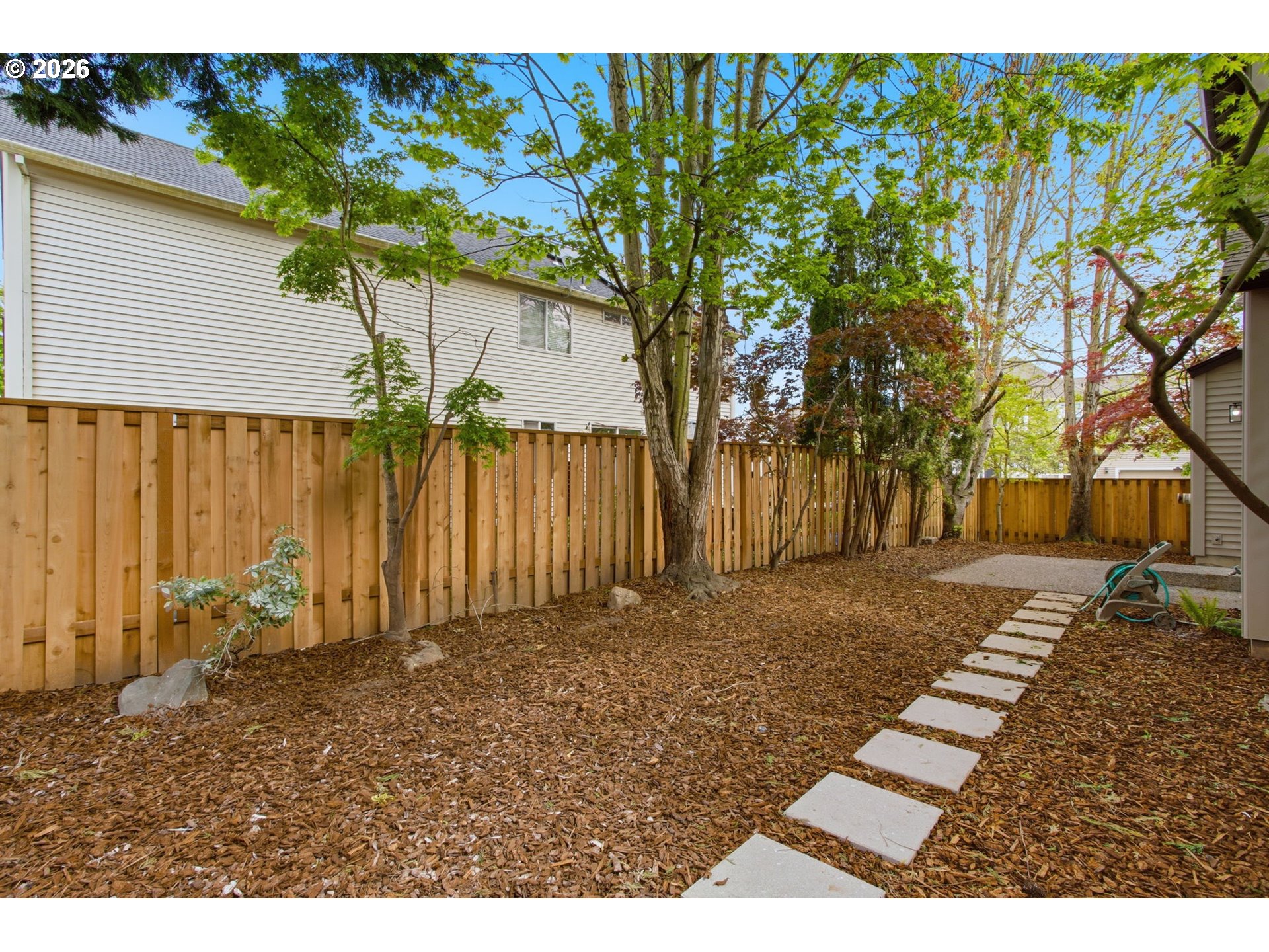 8911 Southwest Gravenstein Lane Tigard, OR 97224 - Photo 31 of 33 a view of a backyard