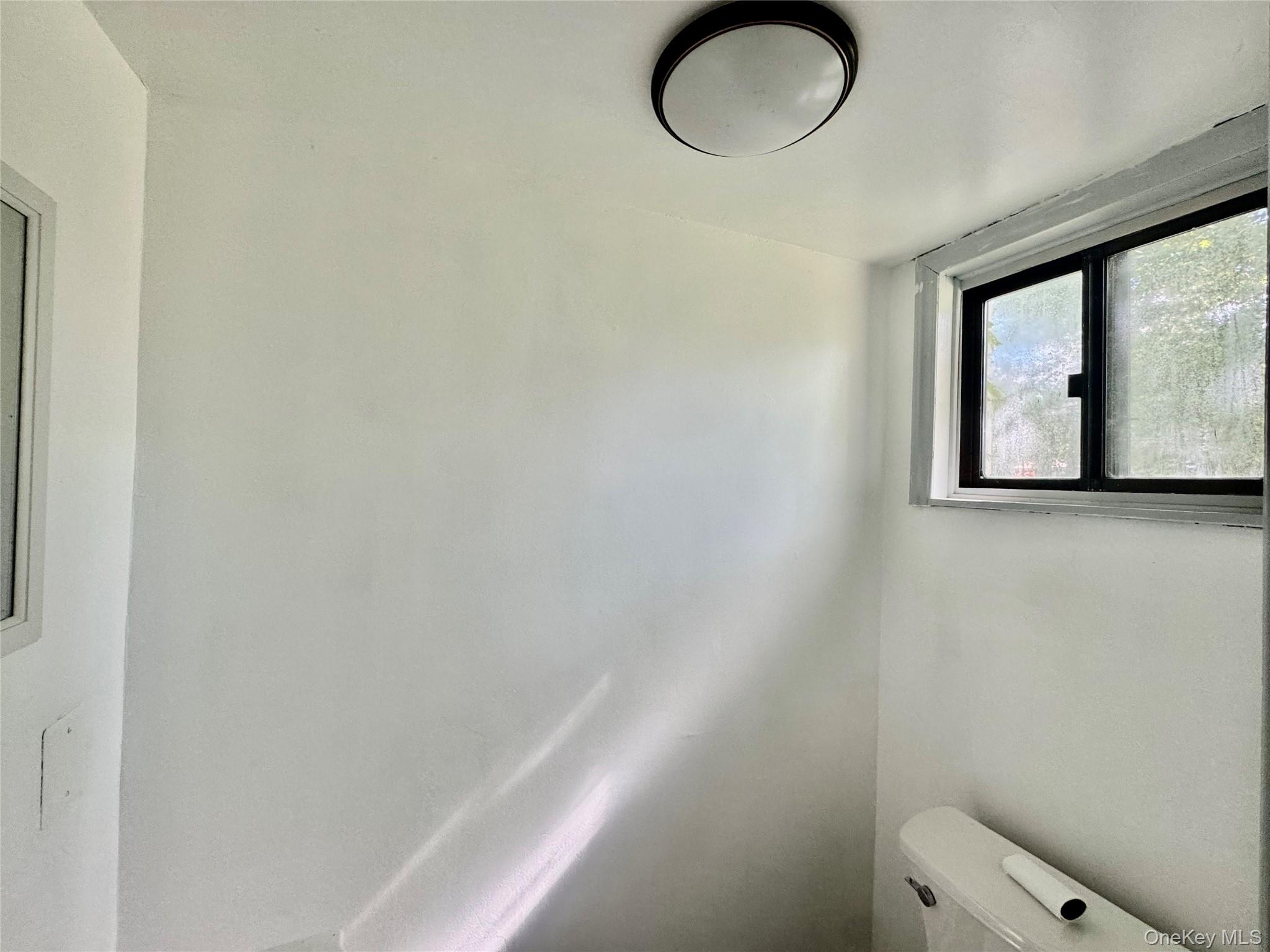 17 North Aspen Road Middletown, NY 10940 - Photo 8 of 12 Half bath featuring toilet