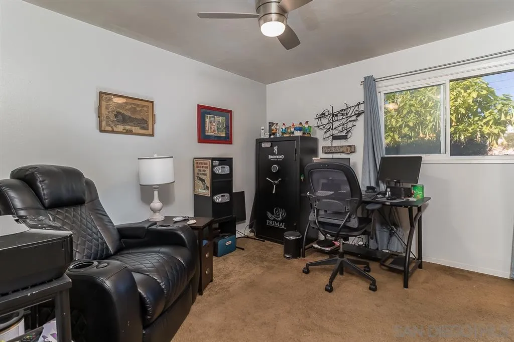 9215 Dalehurst Road Santee, CA 92071 - Photo 15 of 25 a bedroom with furniture and a window