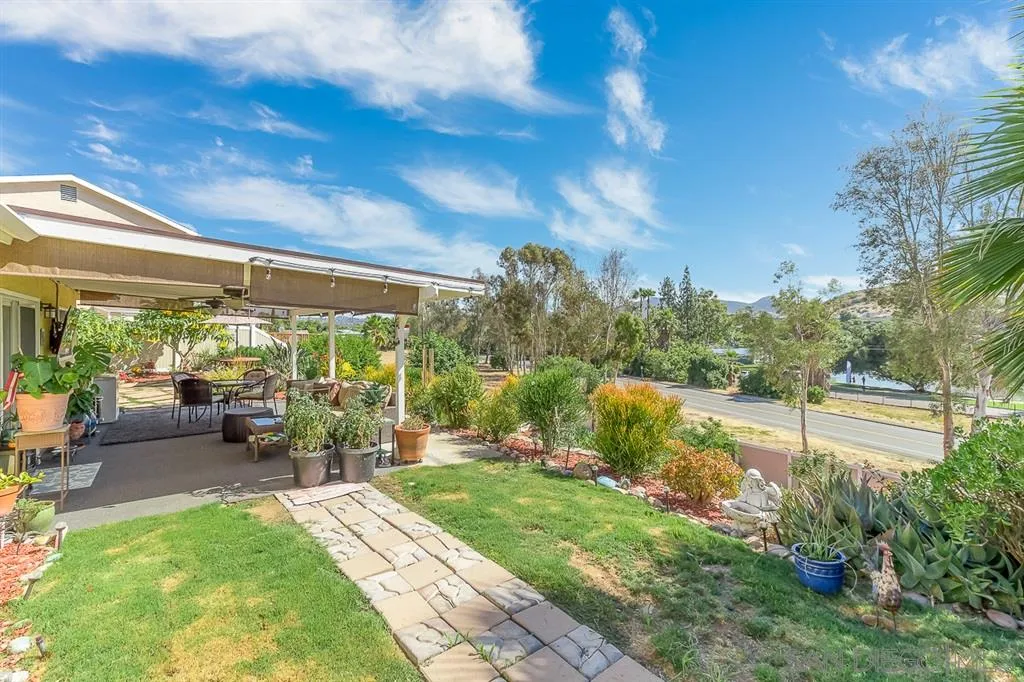 9215 Dalehurst Road Santee, CA 92071 - Photo 17 of 25 a view of a patio with table and chairs and potted plants