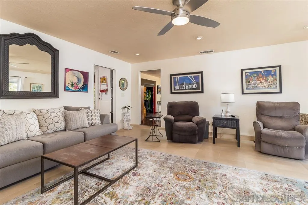 9215 Dalehurst Road Santee, CA 92071 - Photo 3 of 25 a living room with furniture and a couch