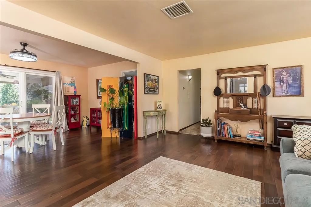 9215 Dalehurst Road Santee, CA 92071 - Photo 5 of 25 a living room with furniture and a wooden floor