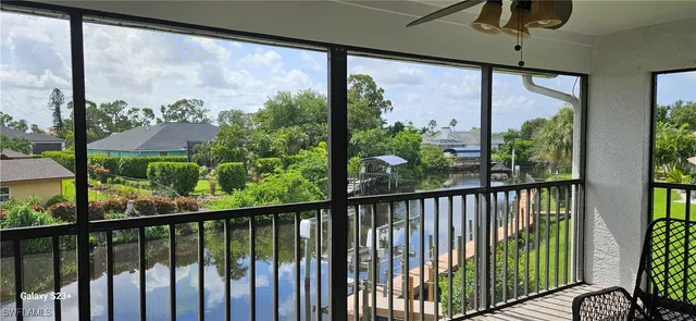 a bathroom with a sink mirror vanity and toilet