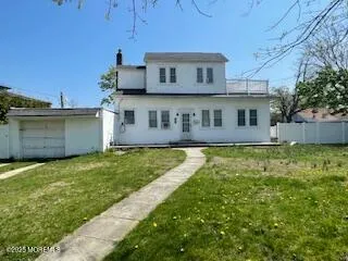 a view of a house with a swimming pool