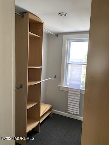 649 Hoey Avenue Long Branch, NJ 07740 - Photo 11 of 13 a view of walk in closet with empty racks