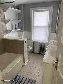 649 Hoey Avenue Long Branch, NJ 07740 - Photo 13 of 13 a bathroom with a bathtub and a window
