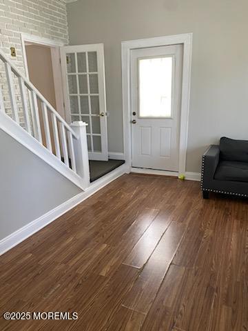 649 Hoey Avenue Long Branch, NJ 07740 - Photo 2 of 13 an empty room with wooden floor and windows