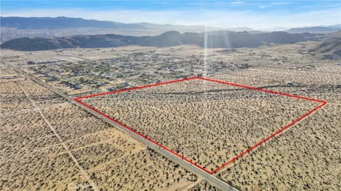 an aerial view of beach and ocean