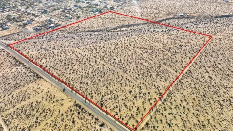 an aerial view of beach and ocean