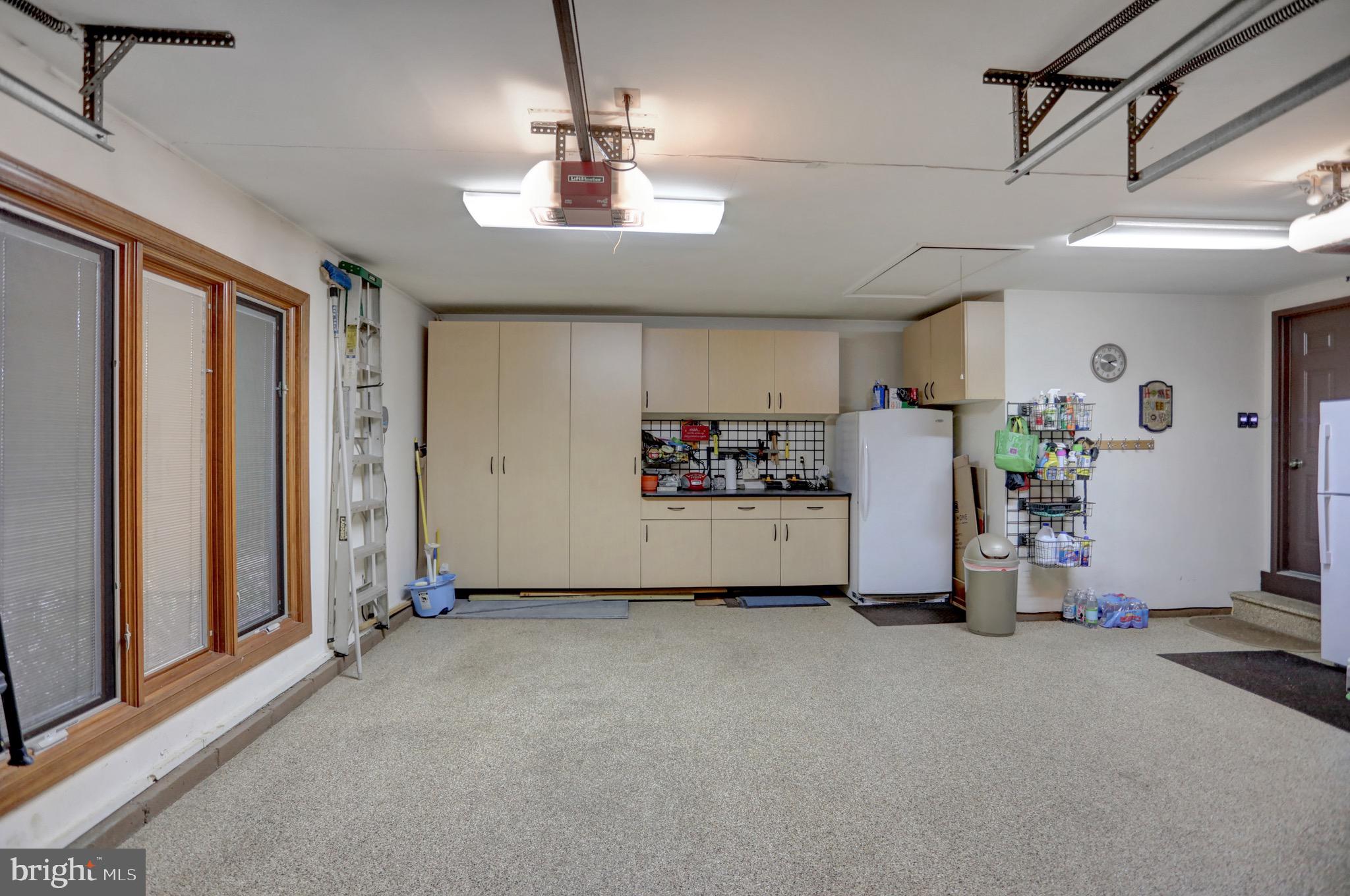 3813 Ady Road Street, MD 21154 - Photo 54 of 67 Garage with cabinetry