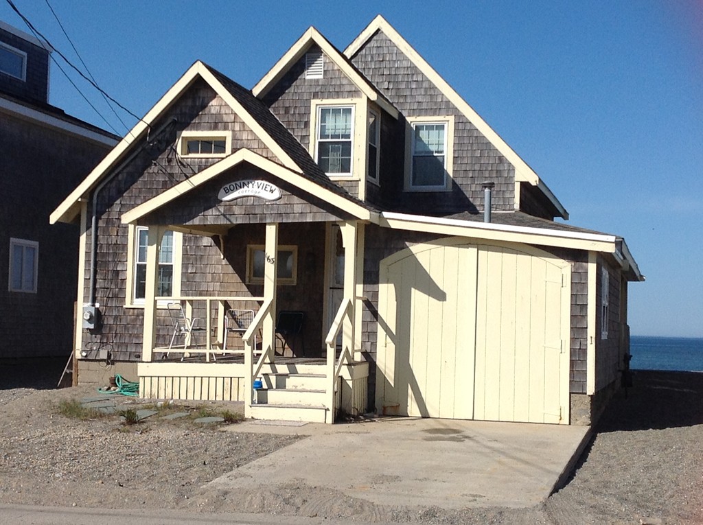 163 Turner Road Scituate, MA 02066 - Photo 1 of 8 a front view of a house with a garden