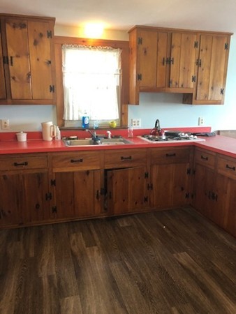163 Turner Road Scituate, MA 02066 - Photo 2 of 8 a kitchen with a sink and cabinets