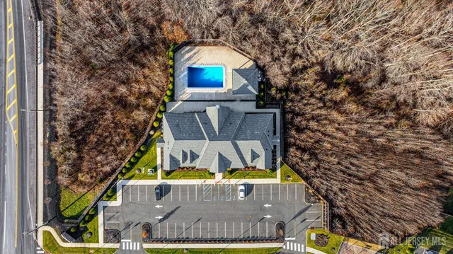 a view of swimming pool with a yard