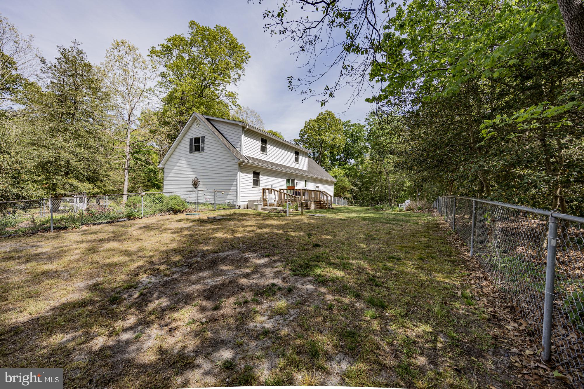 10958 Pit Road Seaford, DE 19973 - Photo 5 of 56 Charming home nestled in nature's embrace.