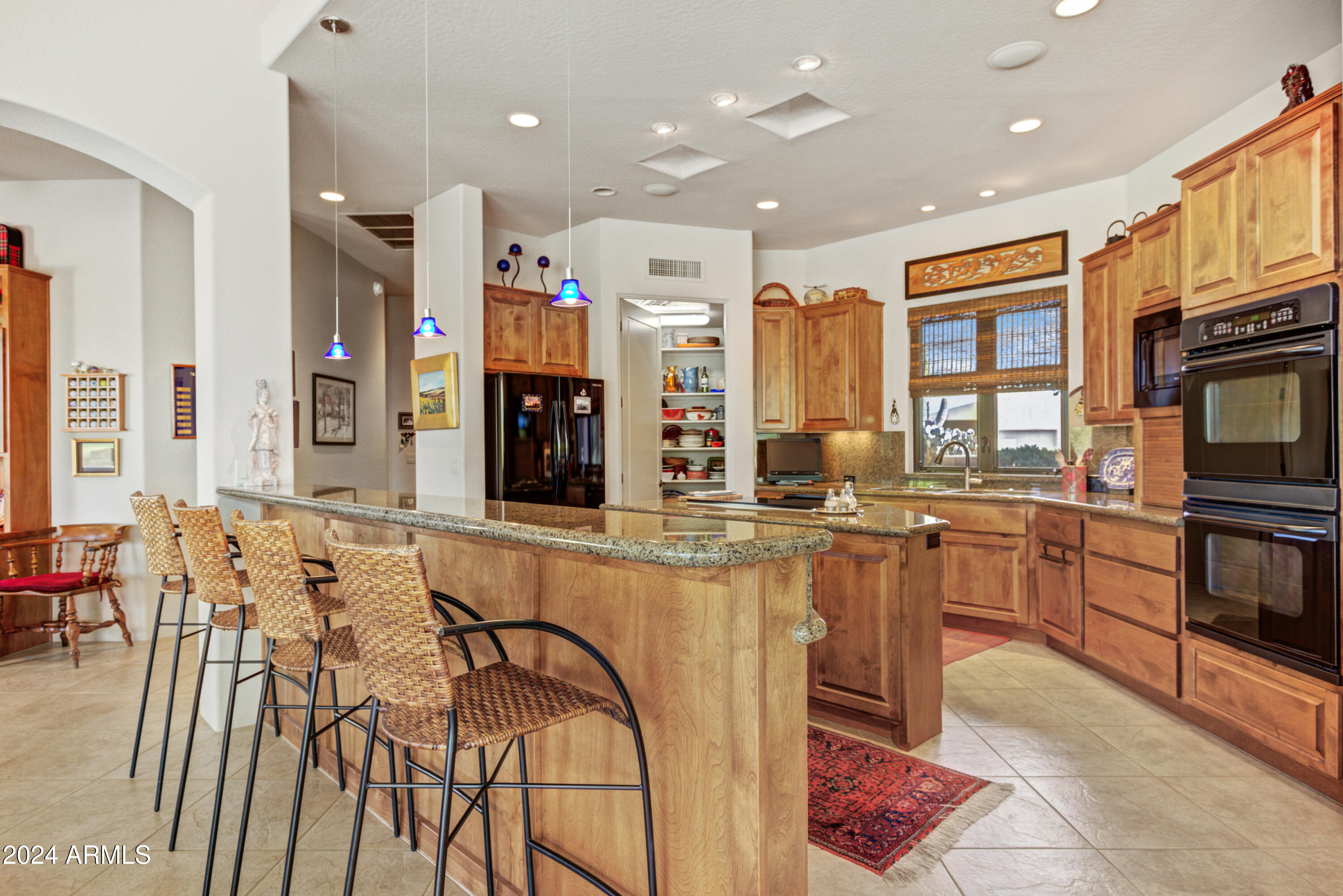 18626 East Picacho Road Rio Verde, AZ 85263 - Photo 11 of 37 Bar Seating in kitchen!