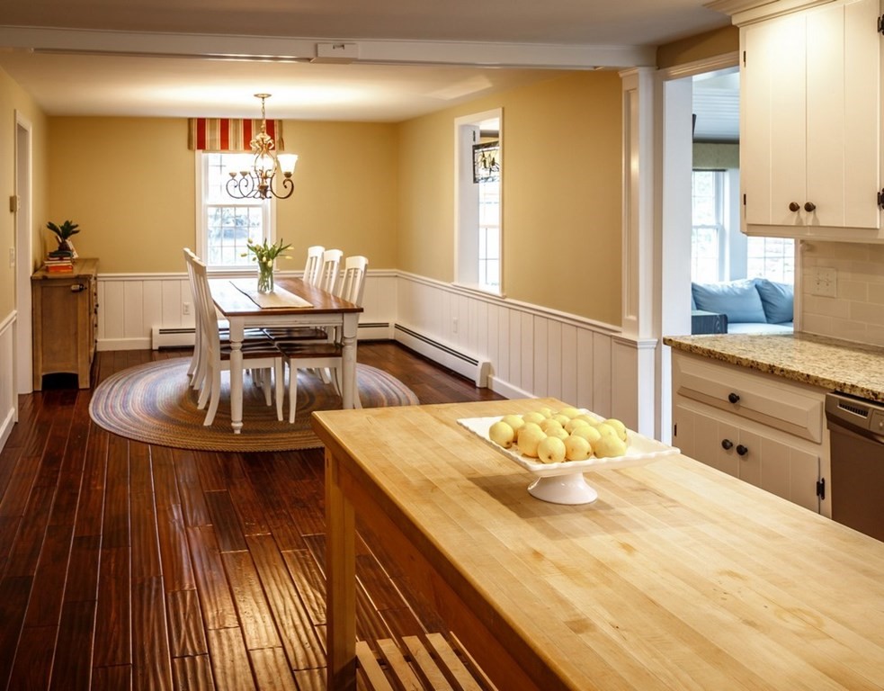 8 Olde Coach Road Westborough, MA 01581 - Photo 12 of 42 a bedroom with a bed and wooden floor