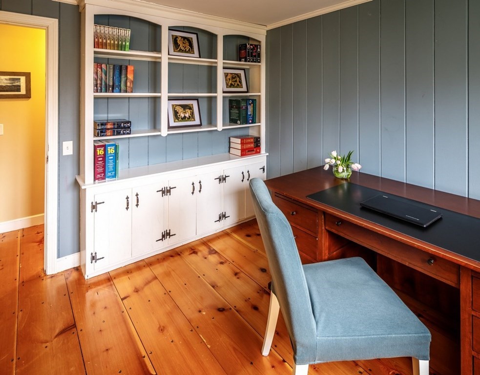 8 Olde Coach Road Westborough, MA 01581 - Photo 18 of 42 a room with furniture and a book shelf