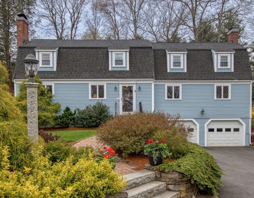8 Olde Coach Road Westborough, MA 01581 - Photo 2 of 42 a front view of a house with a yard and a garden