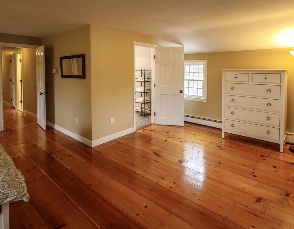 8 Olde Coach Road Westborough, MA 01581 - Photo 25 of 42 wooden floor in an empty room
