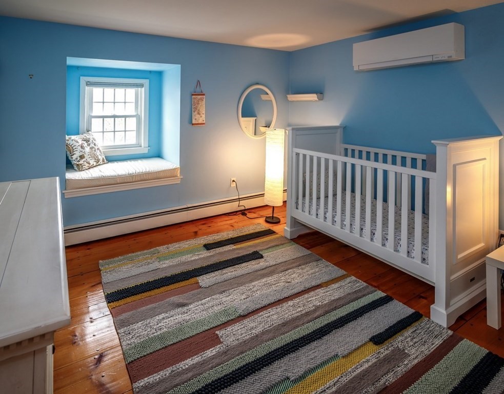 8 Olde Coach Road Westborough, MA 01581 - Photo 29 of 42 a view of a livingroom with furniture and window
