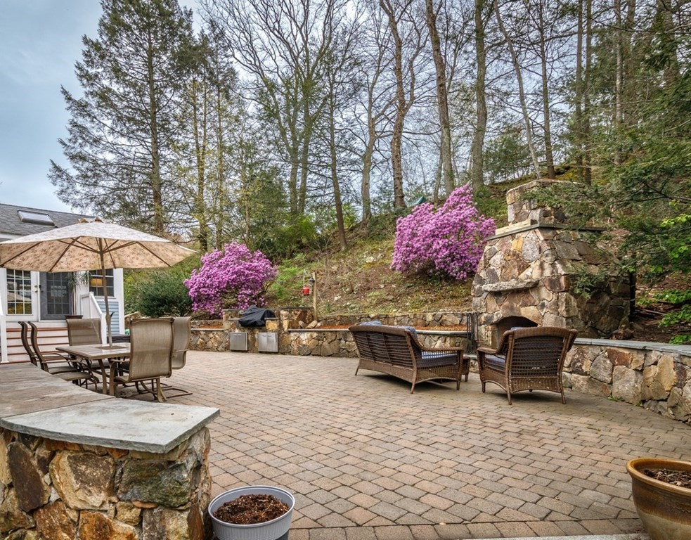 8 Olde Coach Road Westborough, MA 01581 - Photo 3 of 42 a view of a backyard with sitting area