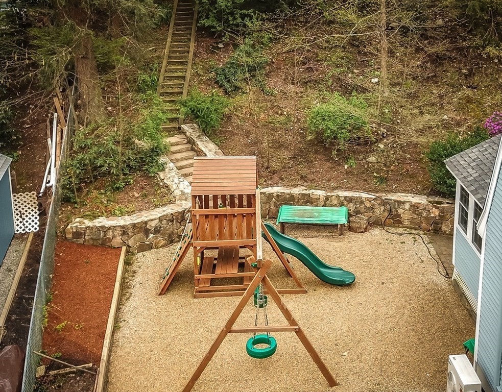 8 Olde Coach Road Westborough, MA 01581 - Photo 37 of 42 a view of a swimming pool with seating area