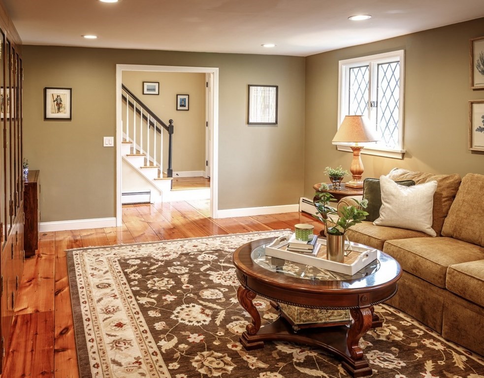 8 Olde Coach Road Westborough, MA 01581 - Photo 6 of 42 a living room with furniture and a table