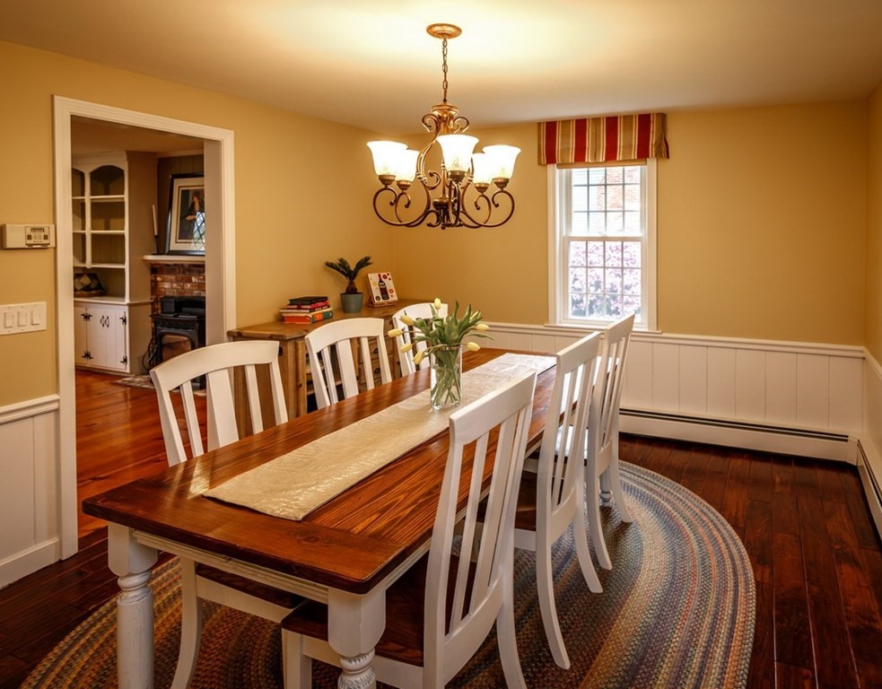 8 Olde Coach Road Westborough, MA 01581 - Photo 7 of 42 a view of a dining room with furniture window and wooden floor