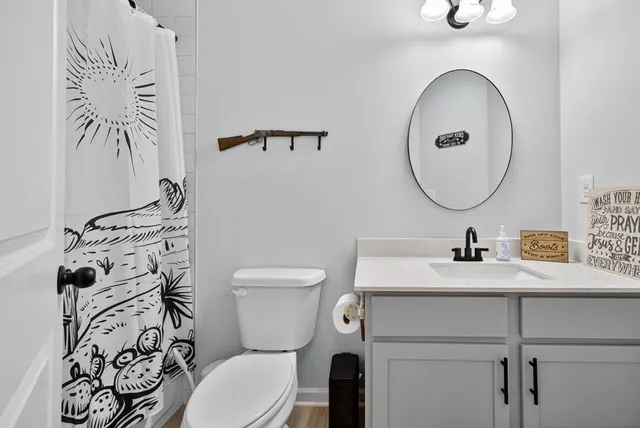 a bedroom that has a bed and a window in it