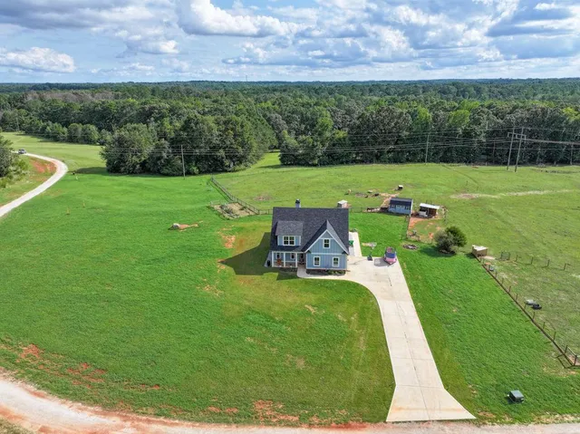 a view of a golf course with a garden