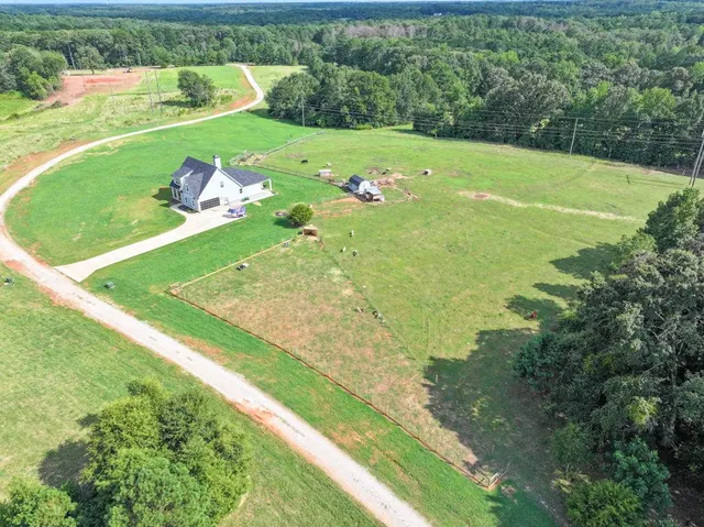 a view of a golf course with a park