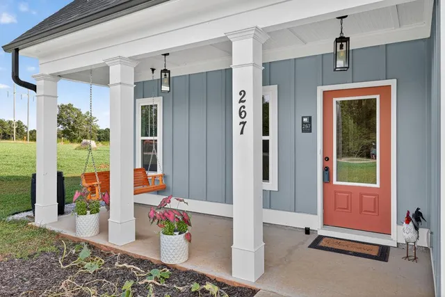 a front view of a house with a porch