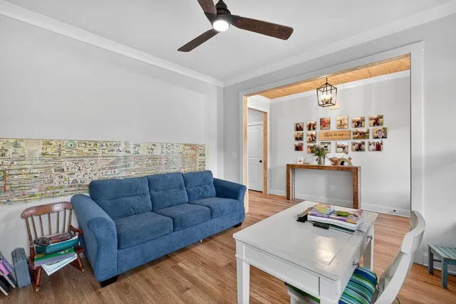 a living room with furniture and a window