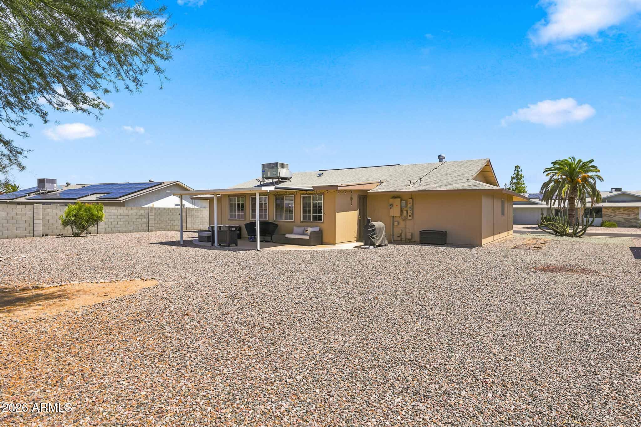 9810 West Blue Ridge Drive Sun City, AZ 85351 - Photo 25 of 29 Backyard Elevation