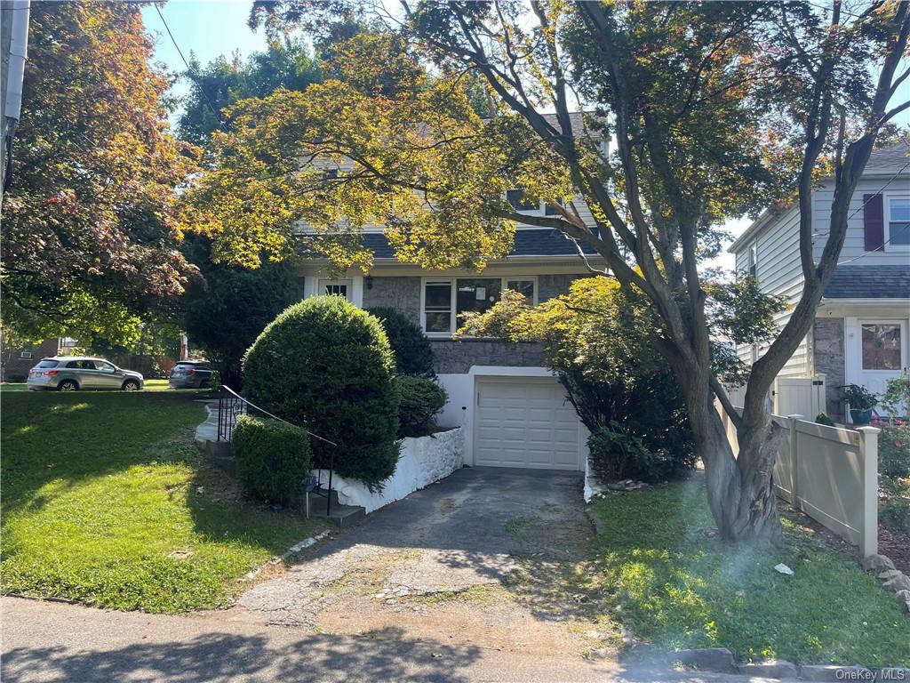 79 Harding Drive New Rochelle, NY 10801 - Photo 1 of 35 a front view of a house with a yard