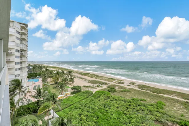 an aerial view of beach and ocean
