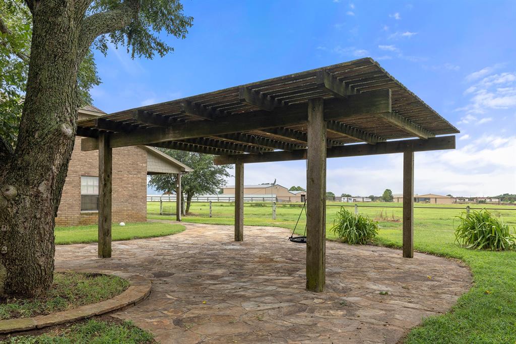789 Stiles Road, Unit 789 Whitesboro, TX 76273 - Photo 7 of 34 View of home's community featuring a patio and a pergola