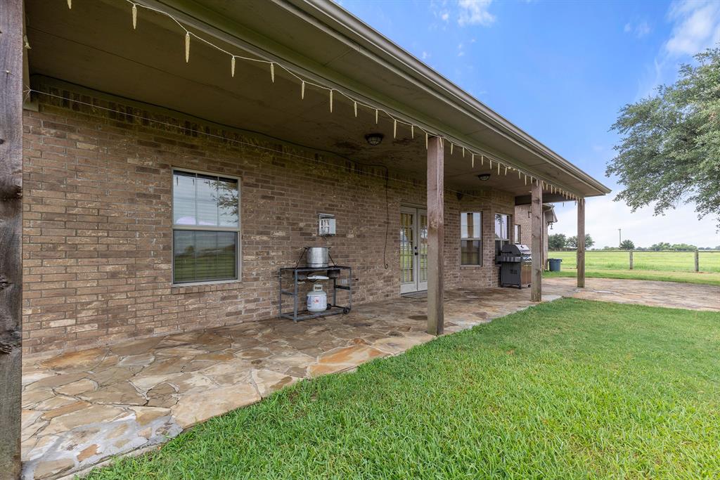 789 Stiles Road, Unit 789 Whitesboro, TX 76273 - Photo 8 of 34 View of patio with area for grilling and french doors