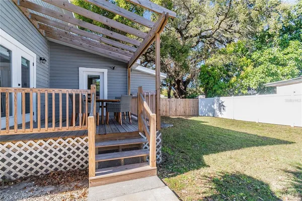 a bathroom with a window and a light fixture