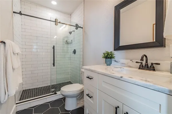 front view of a house with a swimming pool