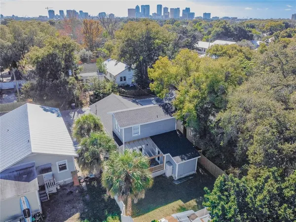 a view of a patio with a table and chairs
