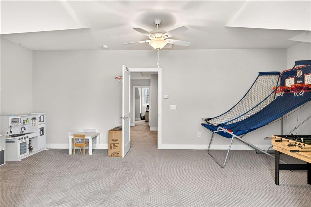 2974 Hermance Drive Northeast Atlanta, GA 30319 - Photo 23 of 38 a living room with furniture and a table