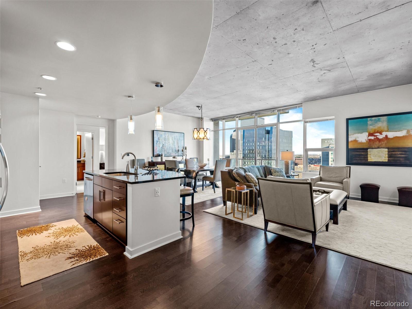 891 14th Street, Unit 3510 Denver, CO 80202 - Photo 2 of 50 a kitchen with a sink cabinets and wooden floor