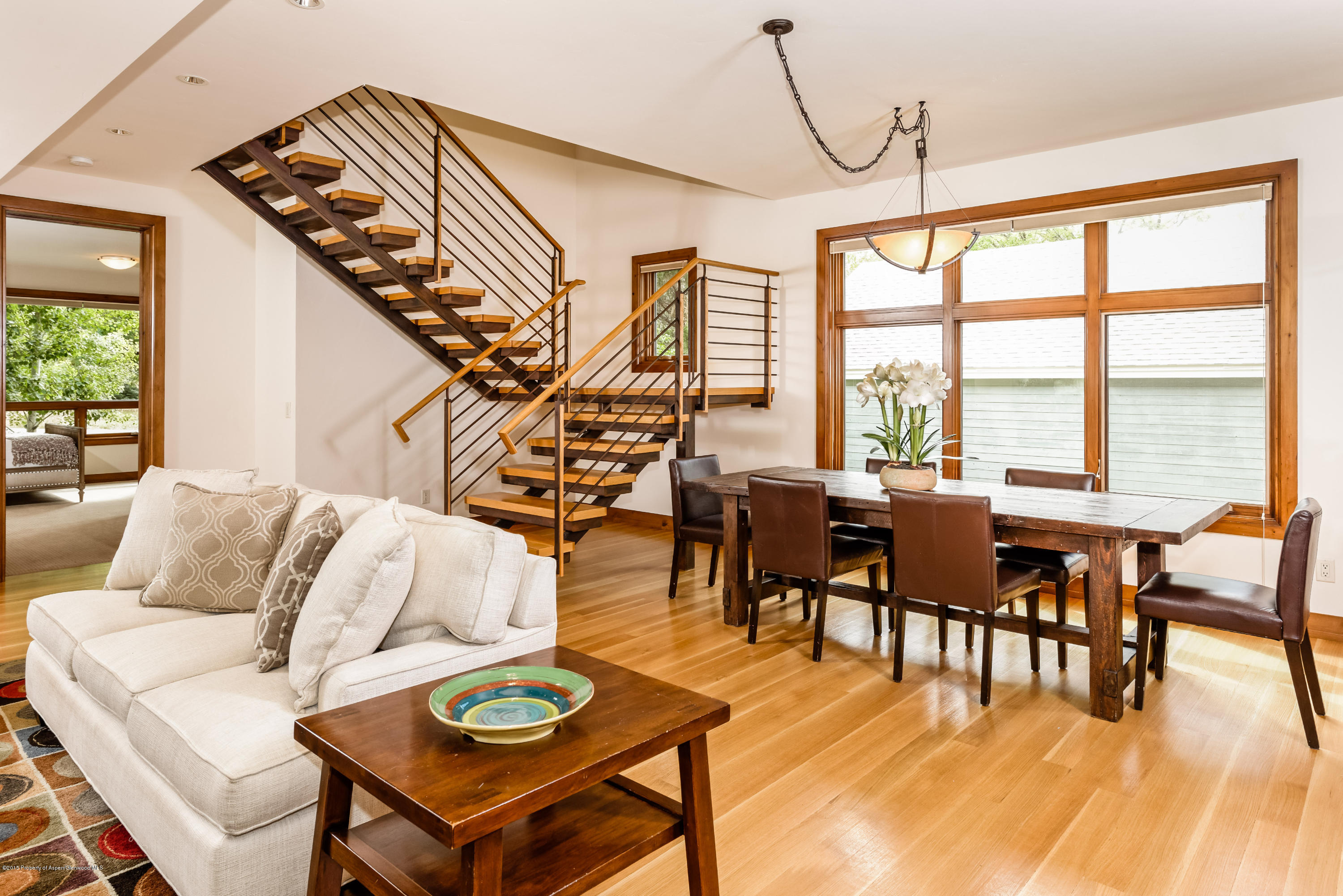 360 Riverside Drive Basalt, CO 81621 - Photo 8 of 29 a living room with furniture and wooden floor