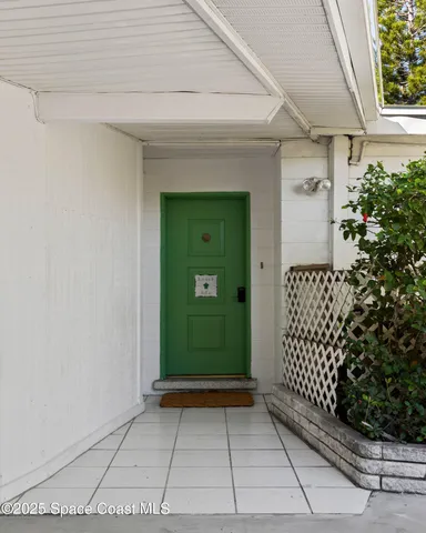 a view of a entryway door of the house