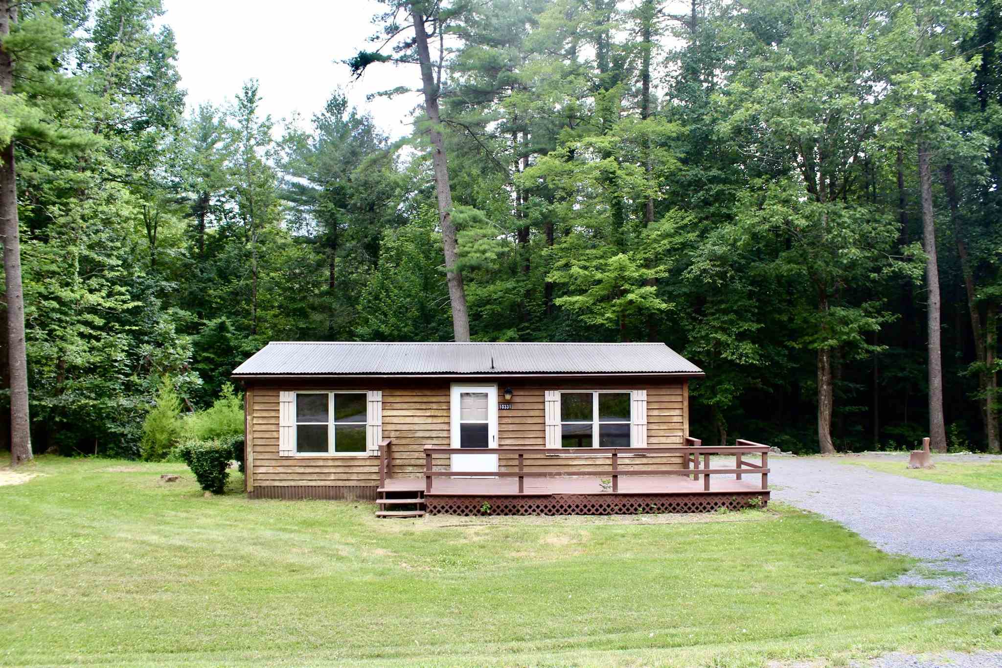 10331 Union Springs Road Dayton, VA 22821 - Photo 1 of 10 a front view of a house with a garden