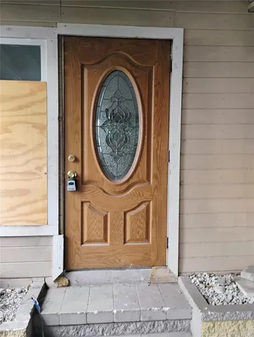 a bathroom with a sink a mirror and a shower