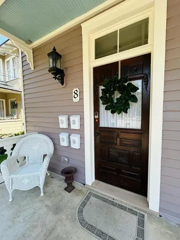front view of a house with a small yard